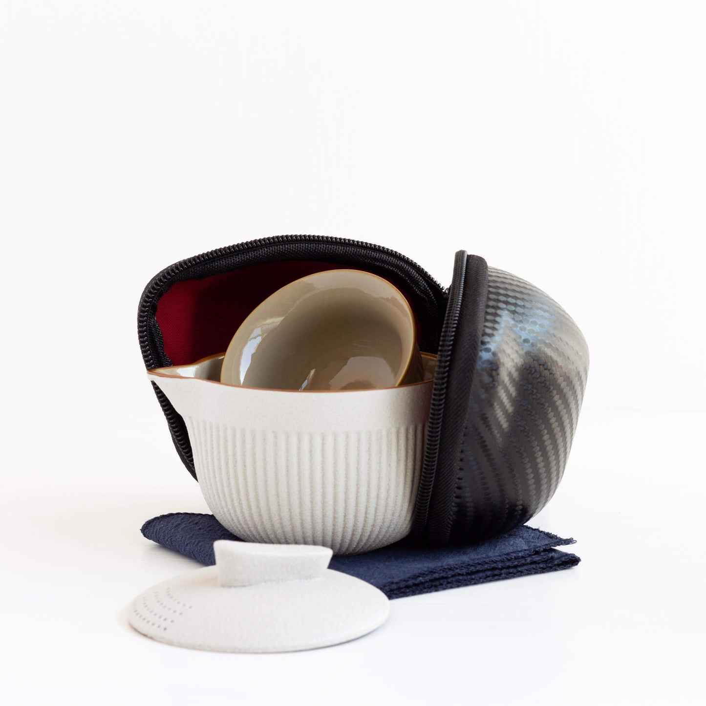 Tea travel set being put in case