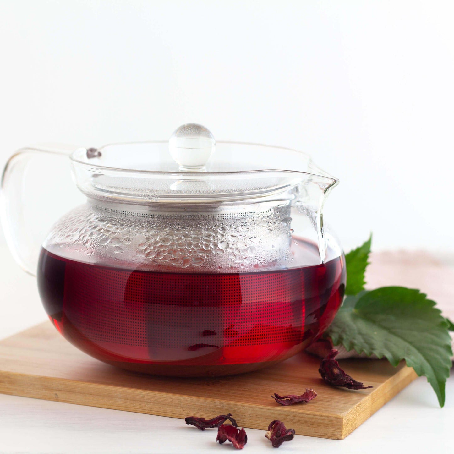 Glass teapot of Hibiscus Organic Herbal Tea