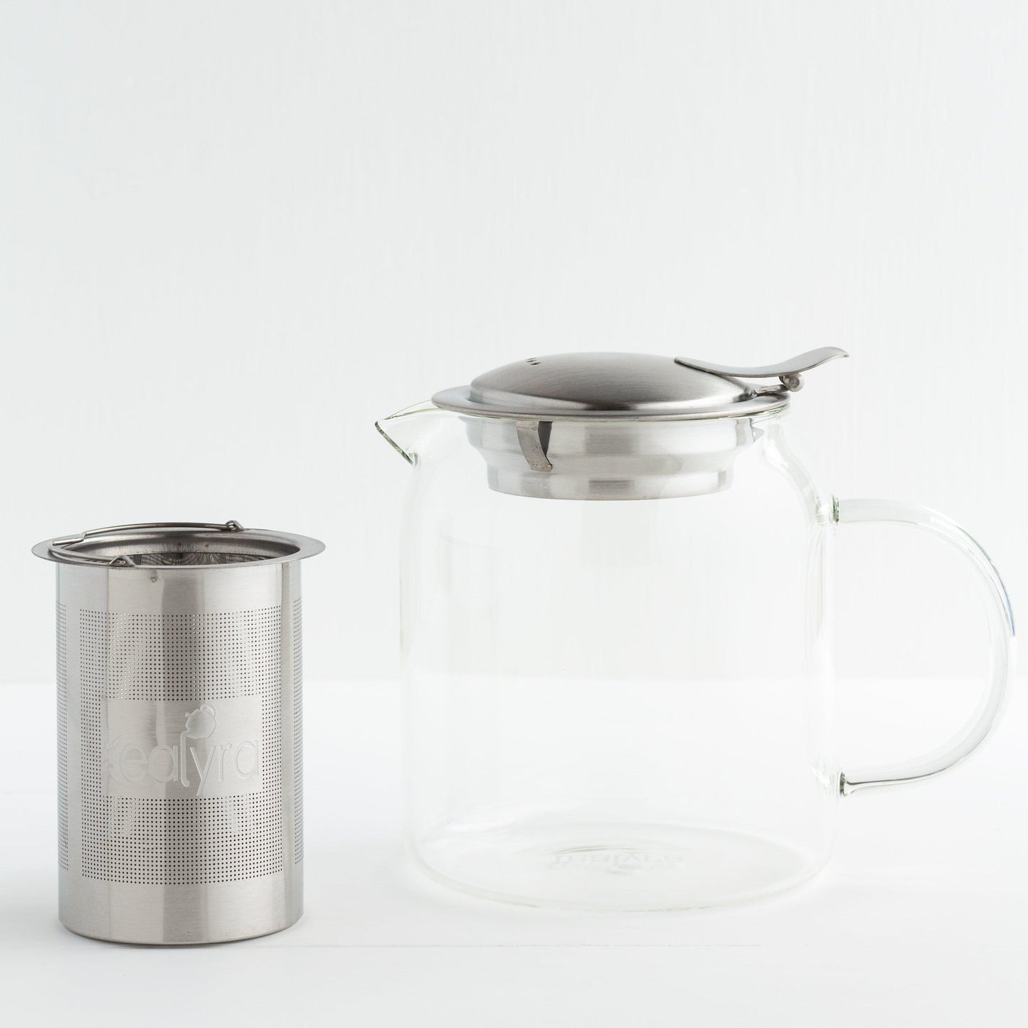 Glass Teapot with Stainless Steel Infuser shown with the infuser outside of the teapot