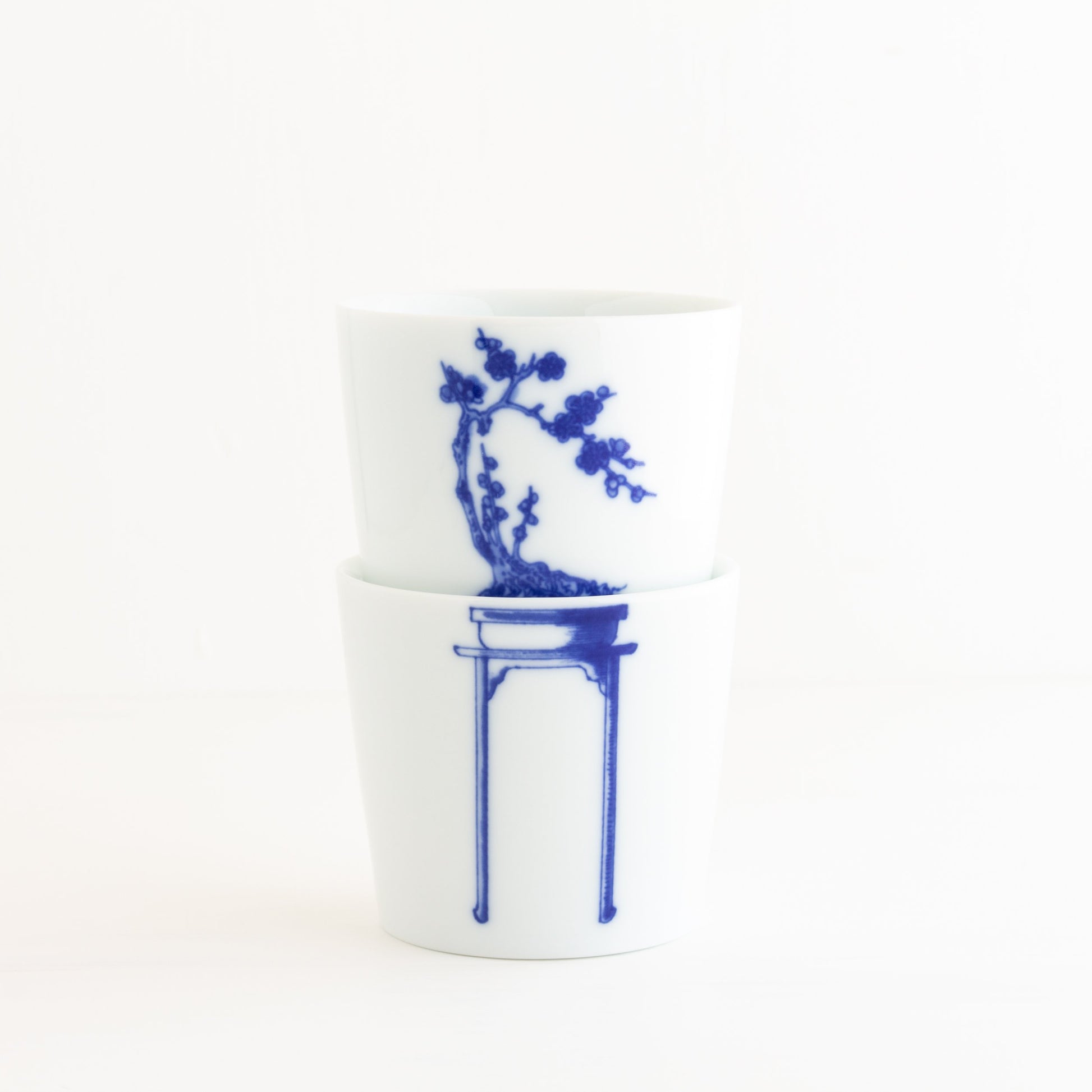 Bonsai Cups - Plum Blossom design, showing two cups stacked together